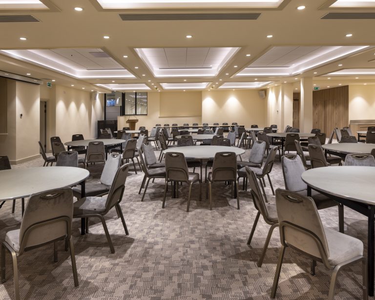 Wolfson Hall event space set up with round tables at The Central